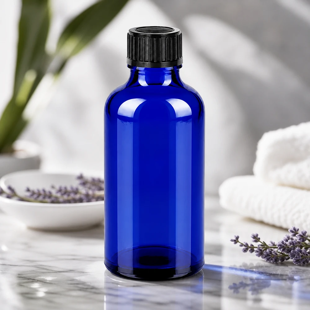 Botella 50ml tapón rosca 11mm negro cierre inviolable BlueLine UT18/50 Frasco de farmacia de 50 ml de vidrio azul cobalto con protección UV y tapón negro a prueba de manipulaciones