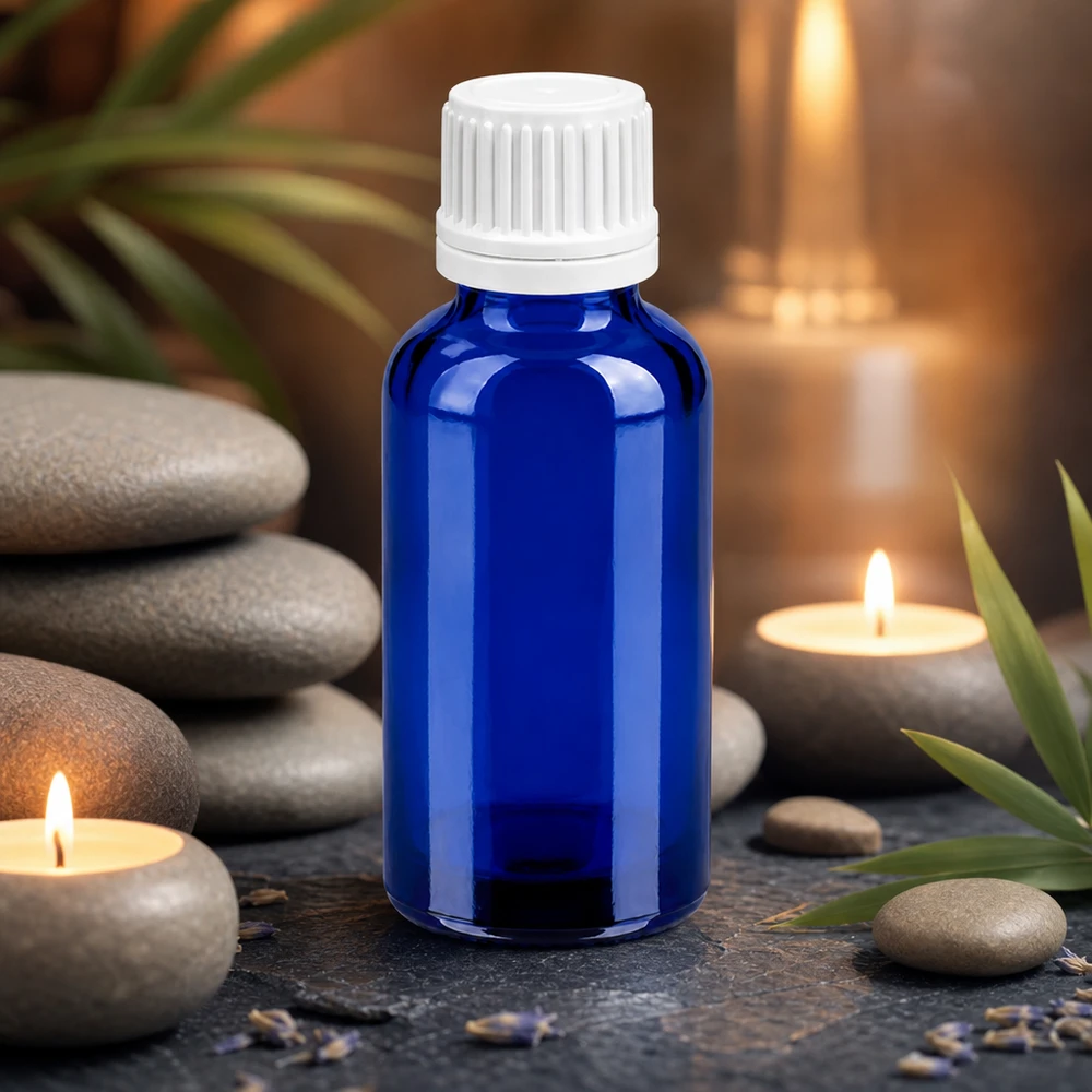 Frasco compacto de 30 ml de vidrio azul con tapa blanca para dosificar líquidos con precisión