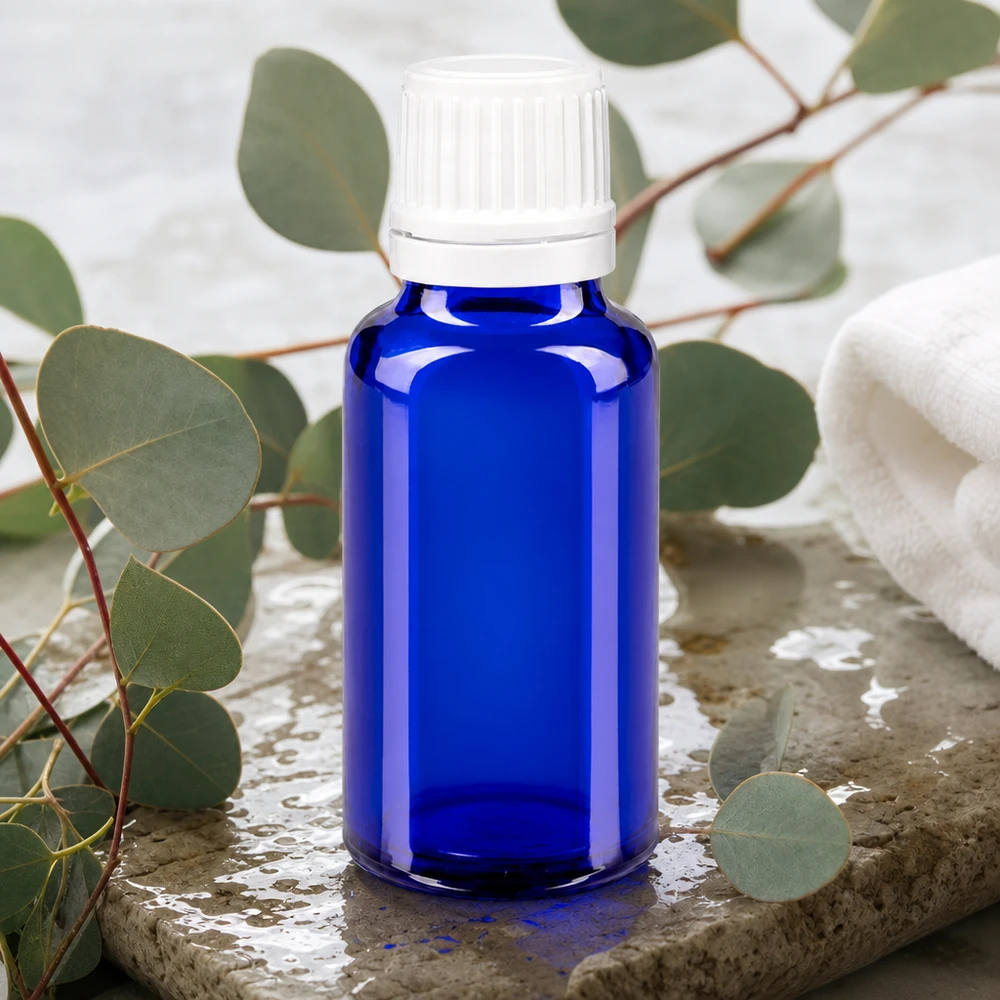 Envase de cristal azul de 20 ml con tapón de seguridad y dosificador preciso de 0,7 mm para aceites