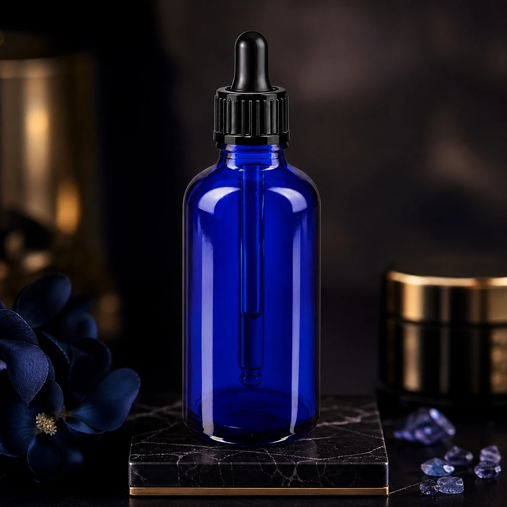 Frasco cuentagotas azul de 50 ml, fabricado en vidrio de farmacia STD, con tapón de pipeta negro y base de mármol