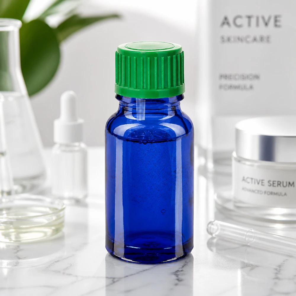 Frasco de vidrio azul de 10 ml con tapón cuentagotas verde UT18 para cosméticos y sueros