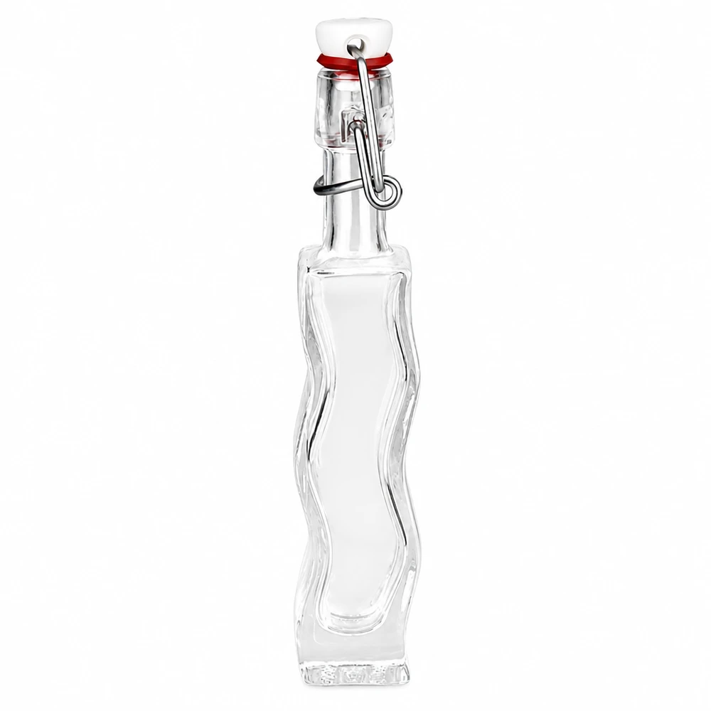 Botella de vidrio de 40 ml «Fila» con tapón de PVC UNiTWIST® Botella de vidrio de 40 ml Anna de vidrio transparente y tapa abatible de PVC blanco UNiTWIST, forma curvada