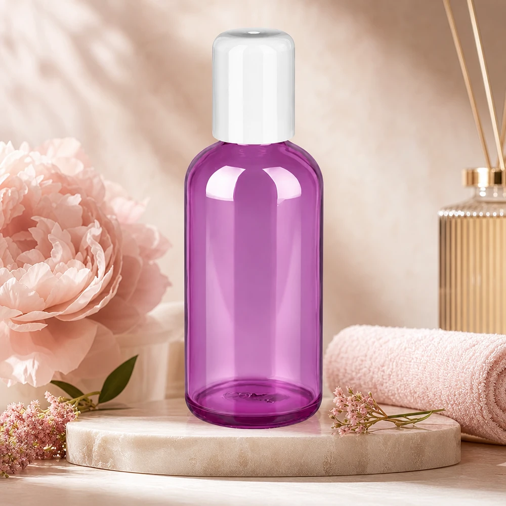 Frasco roll-on transparente de 100 ml en un elegante color morado con práctico aplicador de bola