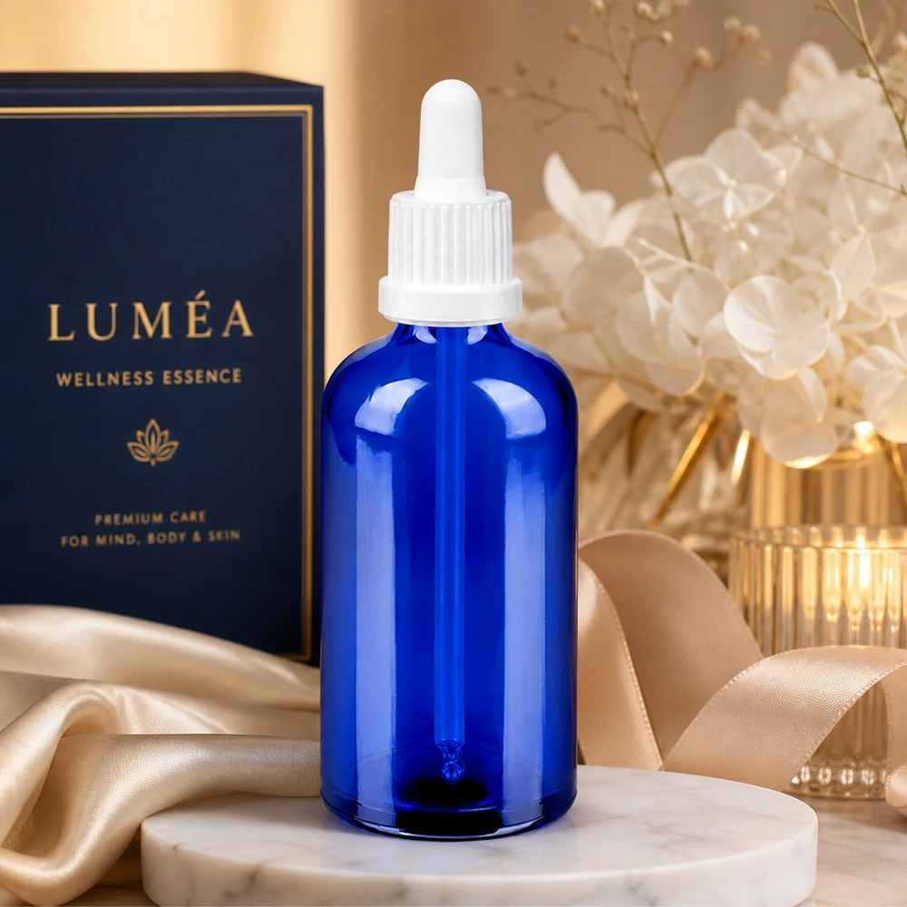Frasco pipeta 100ml cierre inviolable blanco BlueLine UT18/100 Elegante frasco de vidrio azul de 100 ml con pipeta blanca para sueros y esencias de bienestar BlueLine UT18/100