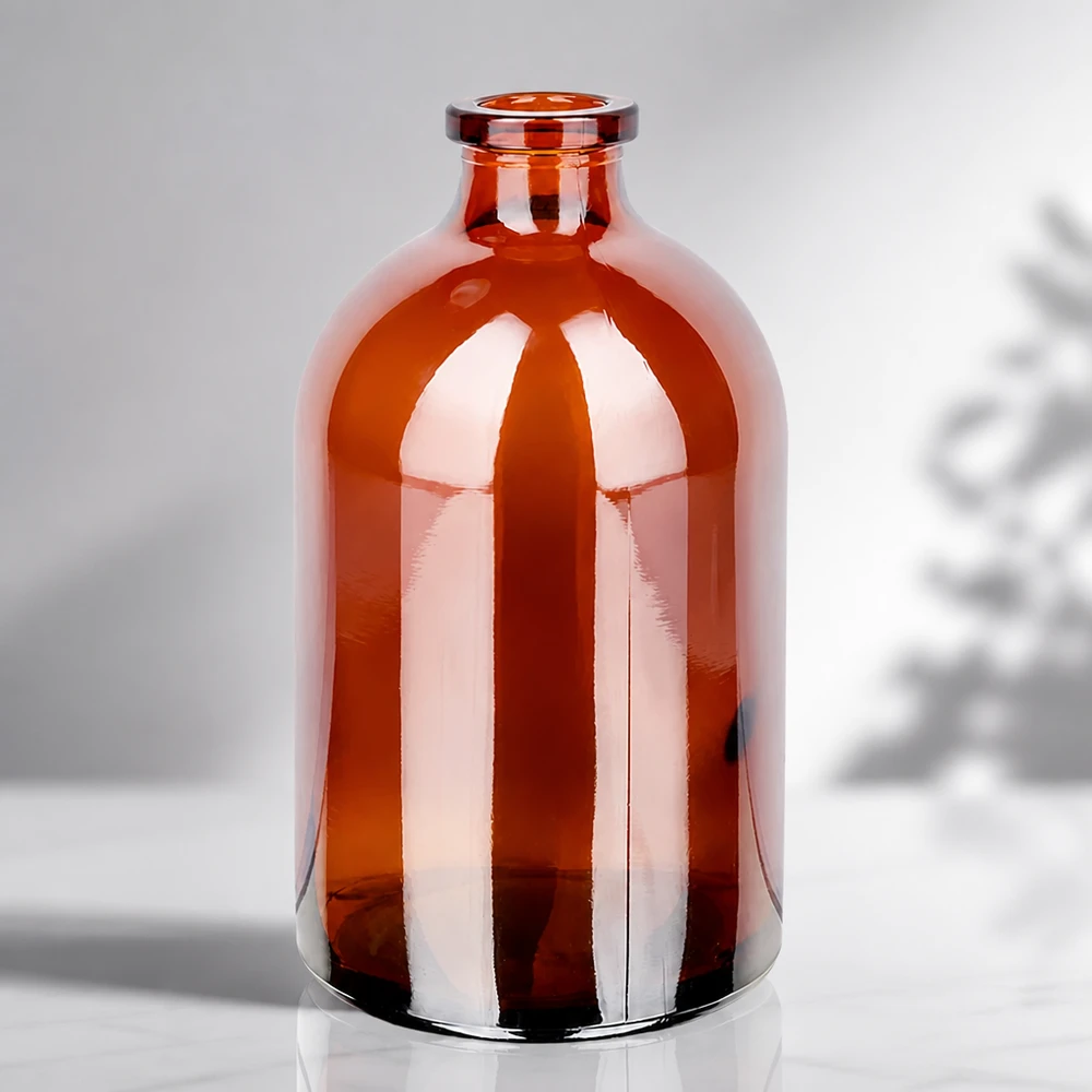 Frasco de inyección de vidrio ámbar 100ml Sterile Glasflasche 100ml in Bernsteinfarbe mit charakteristischer Apothekerflasche-Silhouette