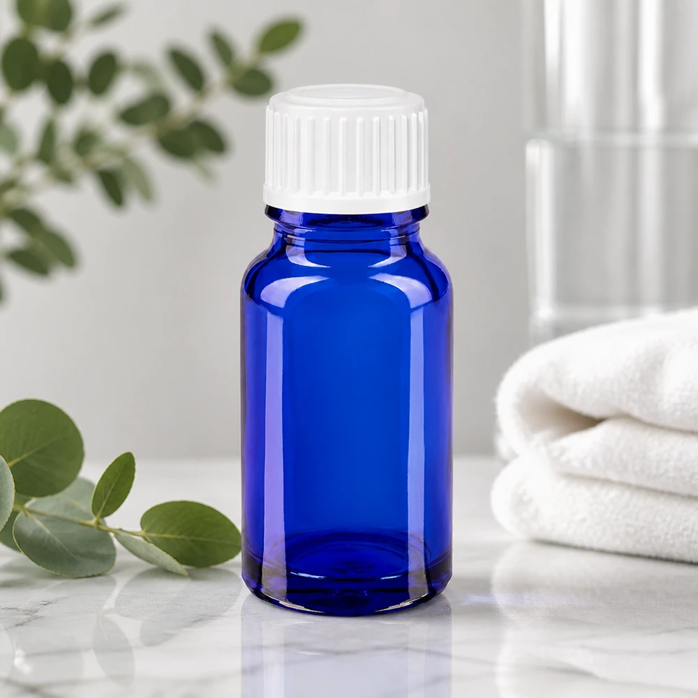 Pequeño frasco de farmacia azul de 10 ml, de vidrio borosilicato, con tapón cuentagotas blanco