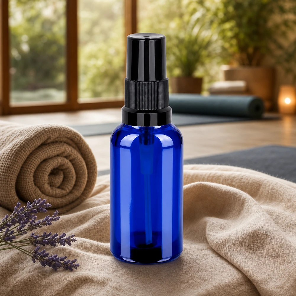 Frasco pulverizador compacto de 30 ml de vidrio azul con cabezal pulverizador negro mate Diseño STD BlueLine