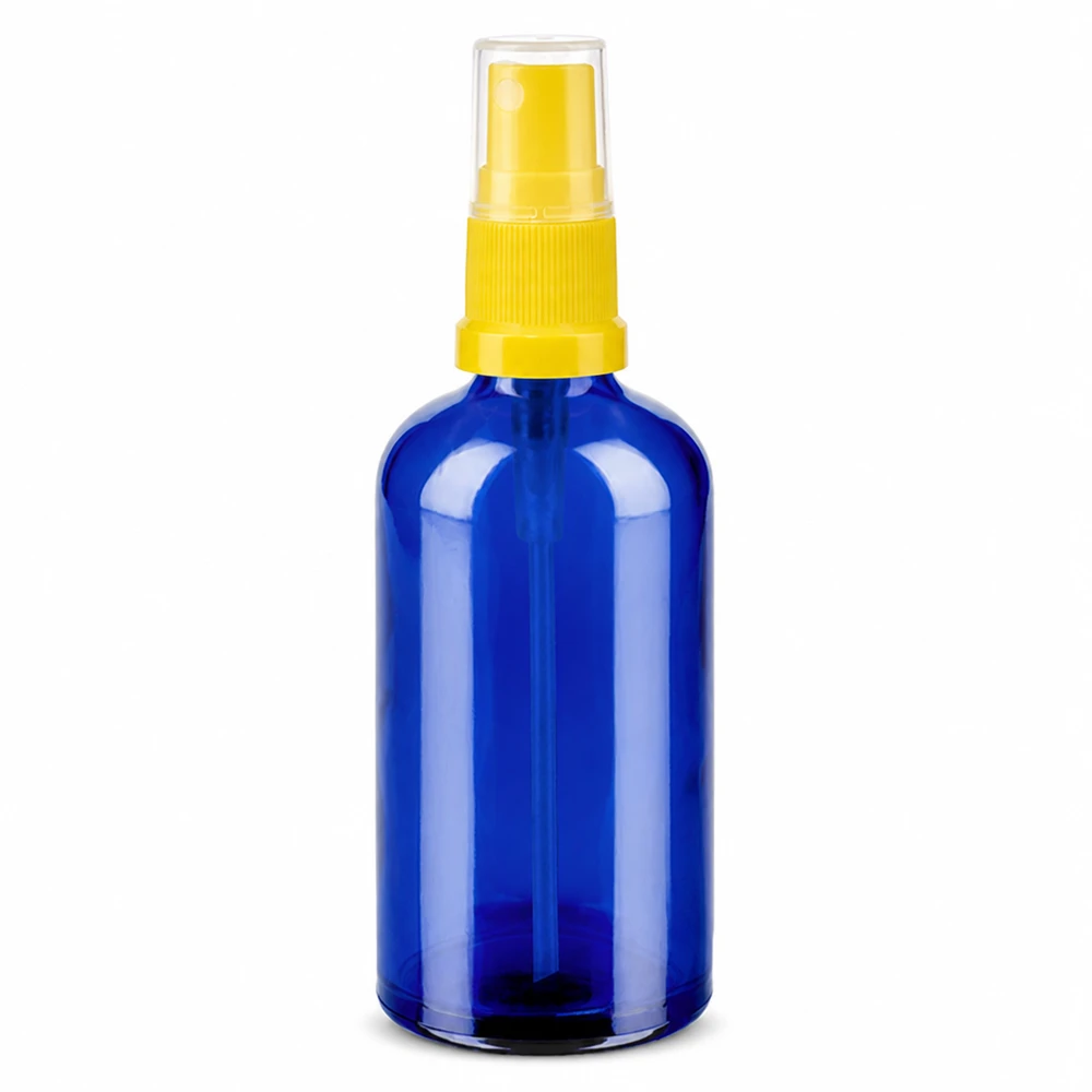 Botella de cristal azul de 100 ml con cabezal pulverizador amarillo para cosmética y aromaterapia