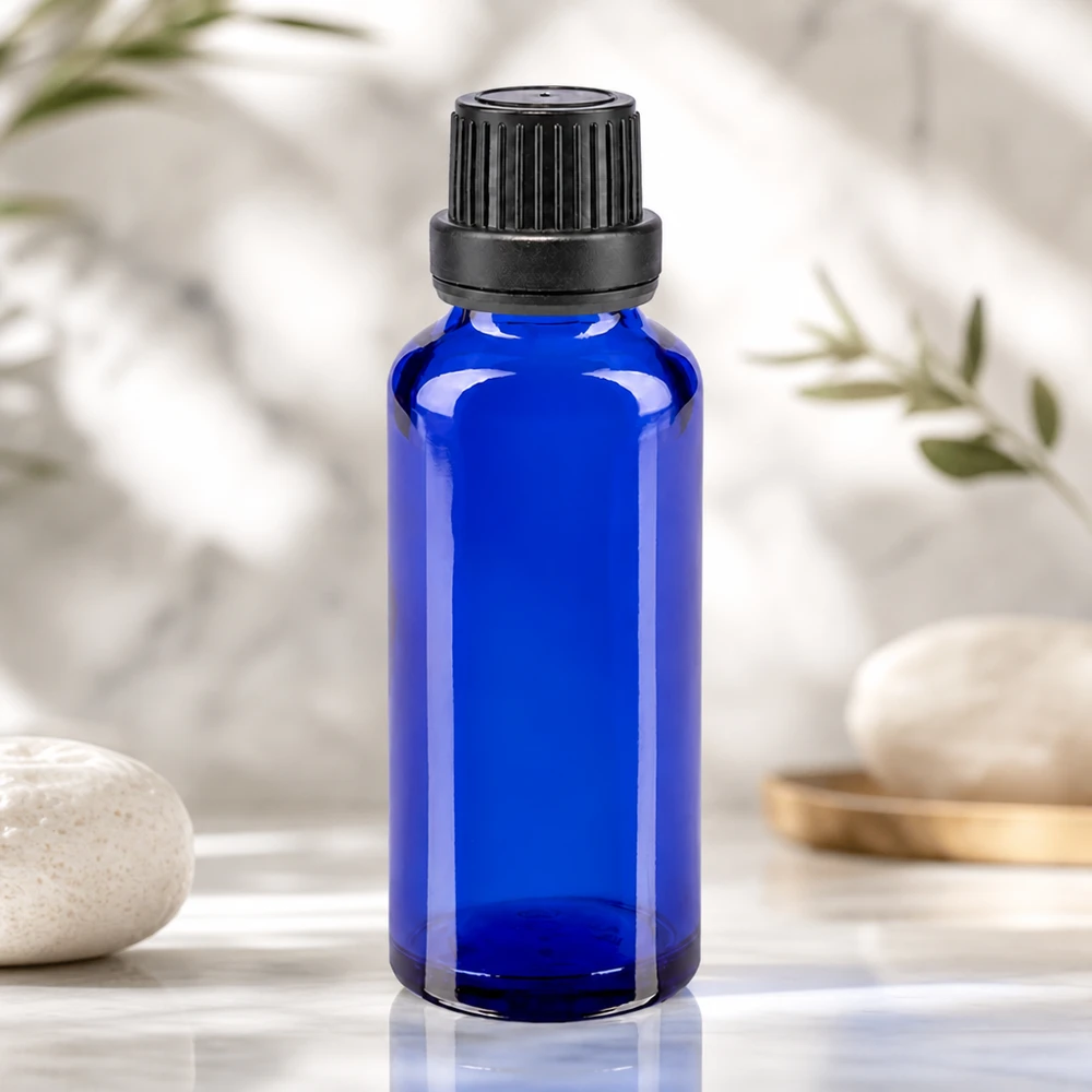 Botella de farmacia azul 30ml tapón rosca negro cierre inviolable Pequeño frasco de farmacia de 30 ml de cristal azul cobalto con tapón de rosca a prueba de niños en color negro