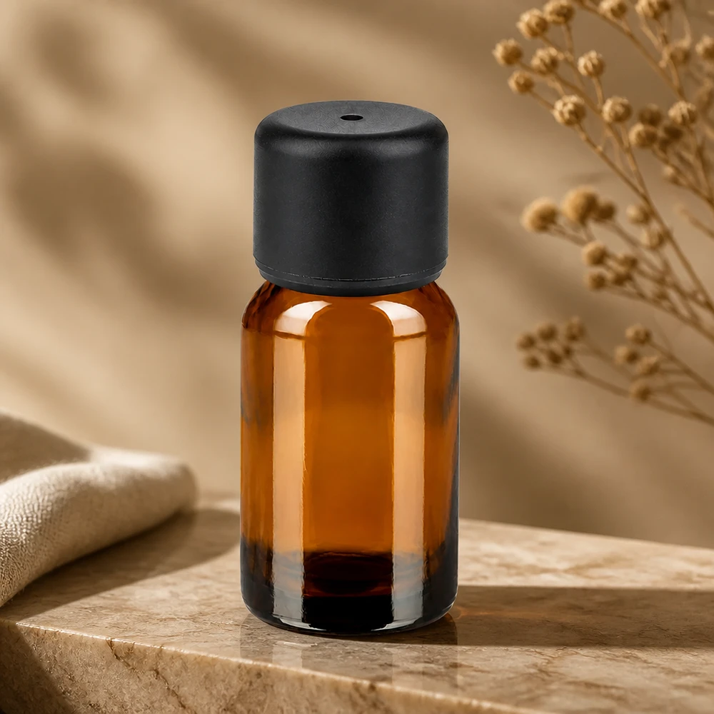 Frasco de vidrio ámbar de 10 ml con tapón de rosca negro antigoteo para una dosificación precisa