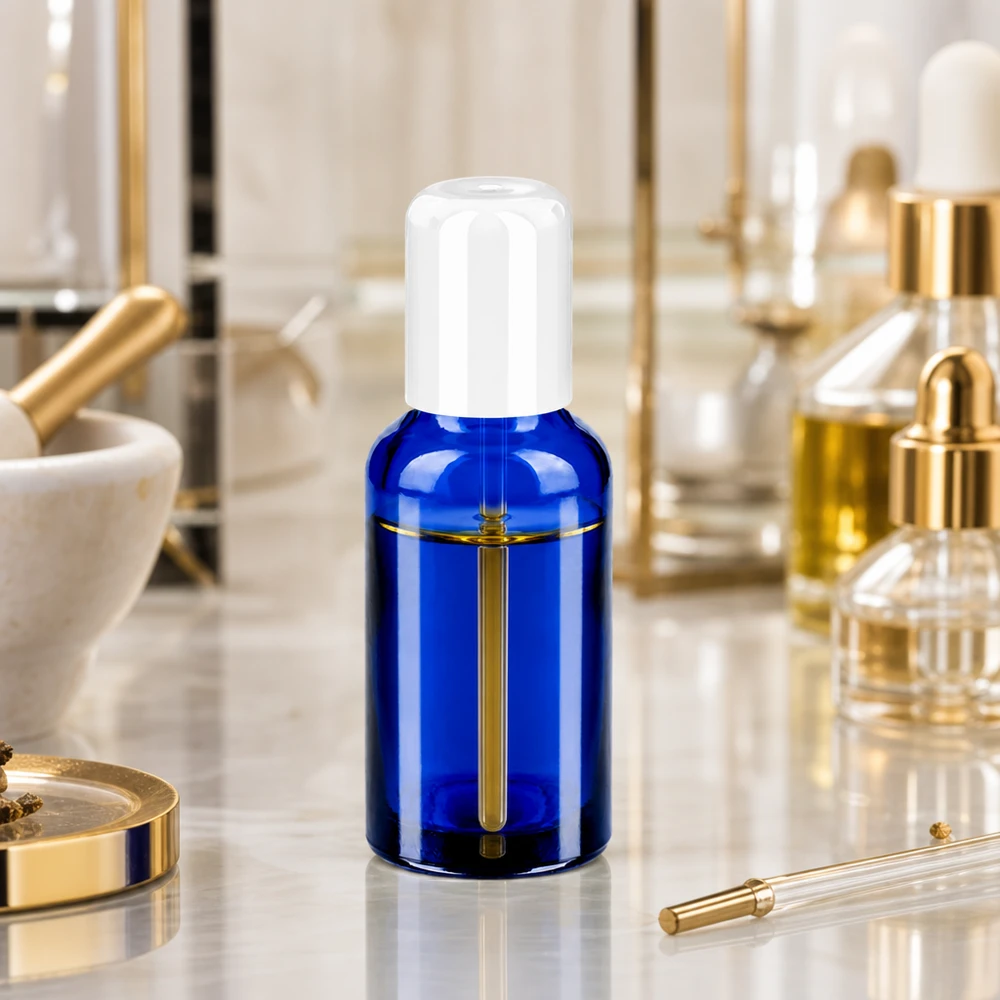 Frasco roll-on 30ml blanco tapón estándar BlueLine UT18/30 Elegante frasco roll-on de 30 ml de vidrio cobalto con protección UV y tapón estándar blanco