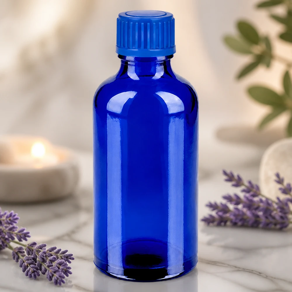 Frasco de cristal de 50 ml de color azul cobalto intenso para aplicaciones profesionales de aromaterapia